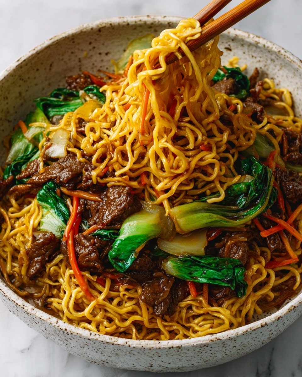 The image shows a white speckled bowl filled with a layered noodle dish. At the bottom, a bed of thin golden-yellow crispy noodles forms the first layer. On top, there are irregular pieces of brown cooked meat mixed with bright green leafy vegetables and light yellow translucent cooked onions. Thin strips of red chili peppers are scattered through the mix, adding a splash of color. A pair of wooden chopsticks, held by a woman's hand, lifts a clump of soft, shiny orange-brown noodles from the center. The background has a white marbled texture. photo taken with an iphone --ar 4:5 --v 7