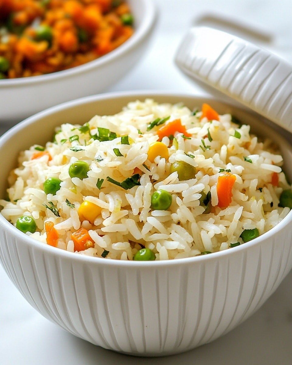 A white round bowl with thin vertical stripes is filled with fluffy, white rice mixed with small pieces of orange carrots, green peas, yellow corn, and green herbs, evenly spread throughout the rice. Next to this bowl is its matching white lid, slightly lifted to reveal the rice inside. In the background, a blurred white bowl with a textured pattern holds a chunky, reddish-orange dish with green garnishes. The bowls sit on a white marbled surface under bright light. photo taken with an iphone --ar 4:5 --v 6.1