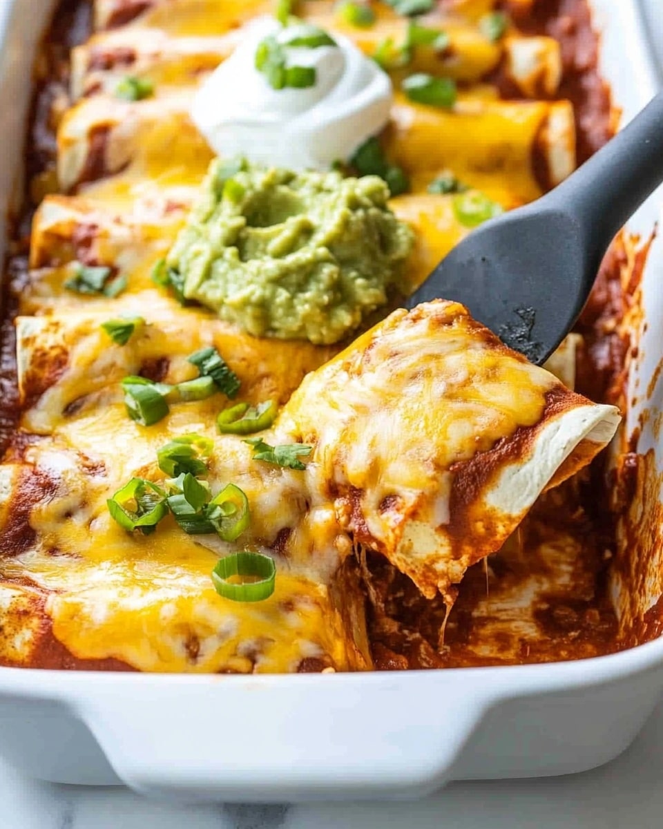 A white rectangular baking dish contains two rows of folded tortillas filled with ingredients, covered with a layer of dark red sauce and melted yellow and white cheese, creating a bubbly and slightly browned texture. Each tortilla is topped with chopped green onions scattered across evenly. There are two dollops of light green guacamole and white sour cream placed near the center of each row. The dish sits on a white marbled surface, with small bowls of guacamole and sour cream nearby. Photo taken with an iphone --ar 4:5 --v 6.1