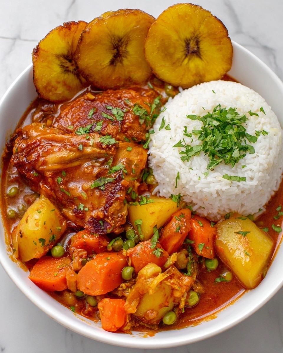 A white bowl with four main parts: two golden, crispy fried plantain slices on the top right, a round mound of white rice garnished with green cilantro on the middle right, and a rich stew filling the rest of the bowl with a large piece of orange-brown cooked chicken in sauce, surrounded by chunks of yellow potatoes, bright orange carrots, and small green peas in a thick reddish-brown sauce. The bowl sits on a white marbled surface. Photo taken with an iphone --ar 4:5 --v 7