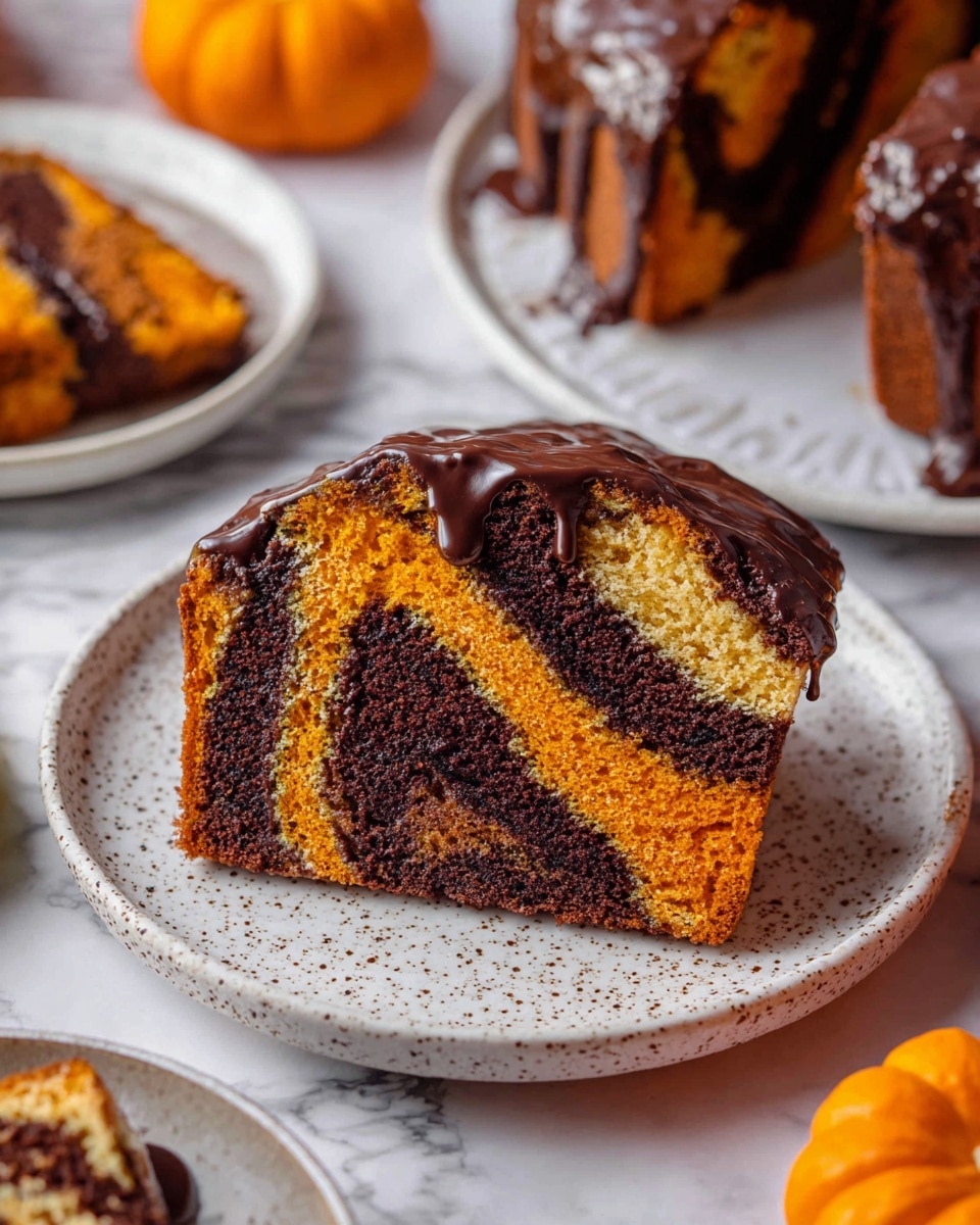 A slice of marble cake sits on a white speckled plate, showing two thick layers of dark brown and bright orange swirled together in a wavy pattern. The top edge of the slice is coated with a glossy dark chocolate layer that drips slightly onto the plate. Surrounding the plate, there are other similar slices on white plates and parts of a cake visible on a white marbled surface, along with small orange pumpkins adding a warm autumn feel. Photo taken with an iphone --ar 4:5 --v 7