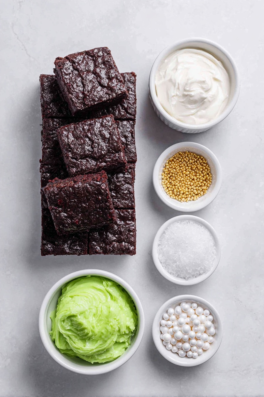 Flat lay of a stack of rich, square homemade brownies with a dark, fudgy texture, a small white ceramic bowl of smooth white frosting, another small white bowl with bright red-tinted frosting, a third small white bowl filled with vibrant green-tinted frosting, a handful of shiny edible gold star sprinkles scattered neatly next to a small pile of glossy white pearl sprinkles, all arranged with perfect symmetry and balance on a clean white marble surface, soft natural light, photo taken with an iPhone, professional food photography style, fresh ingredients, white ceramic bowls, no bottles, no duplicates, no utensils, no packaging --ar 2:3 --v 7 --p m7354615311229779997 - Frosted Christmas Brownie Trees, Christmas brownie treats, holiday dessert ideas, festive brownie recipes, easy Christmas baking