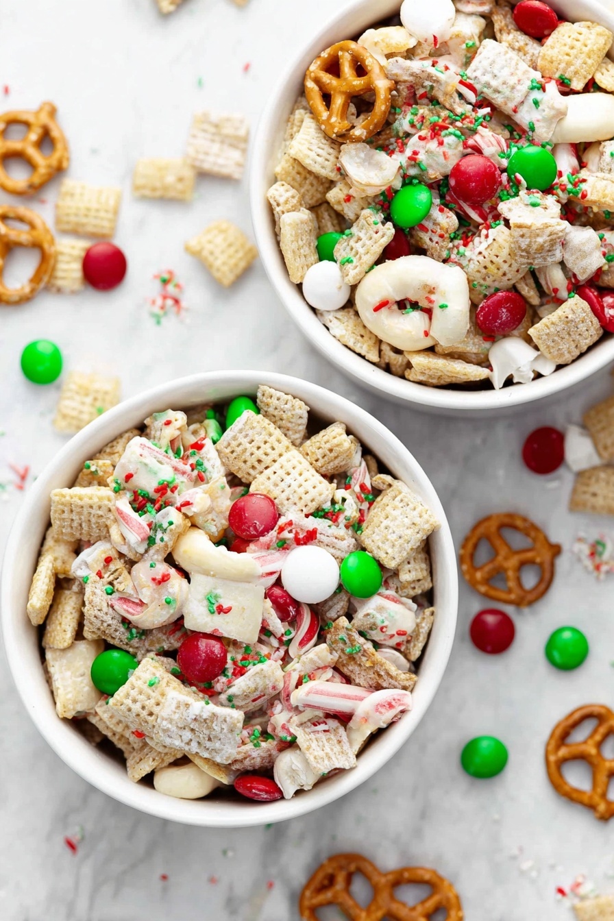 The image shows two white bowls filled with a festive snack mix on a white marbled surface. Each bowl holds a colorful mix of light beige square cereal pieces, white chocolate-covered pretzels, red and green candy-coated chocolates, and small round red, white, and green sprinkles scattered evenly over the mix. The colors are bright and create a holiday feel. Some pieces of the mix are scattered on the surface around the bowls. Photo taken with an iphone --ar 2:3 --v 7 - Festive Gluten-Free Christmas Chex Mix, gluten-free holiday snack, Christmas snack mix, easy holiday party food, festive Christmas treats
