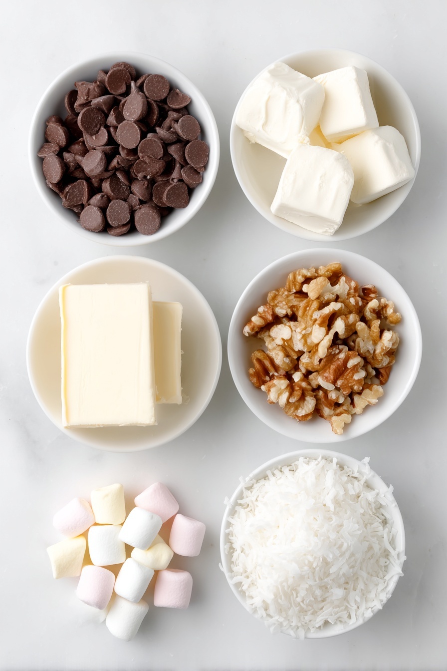 Flat lay of a small pile of glossy semisweet chocolate chips, several cubes of pale yellow butter, a scattered handful of pastel miniature marshmallows in soft pink, white, and yellow hues, a small mound of toasted chopped walnuts with a golden-brown tone, and a neat pile of white flaked coconut, all arranged separately in simple white ceramic bowls or directly on the surface, placed on a clean white marble surface, soft natural light, photo taken with an iPhone, professional food photography style, fresh ingredients, white ceramic bowls, no bottles, no duplicates, no utensils, no packaging --ar 2:3 --v 7 --p m7354615311229779997 - No-Bake Church Window Cookies, easy no-bake cookies, festive holiday treats, colorful chocolate cookies, Christmas dessert recipes