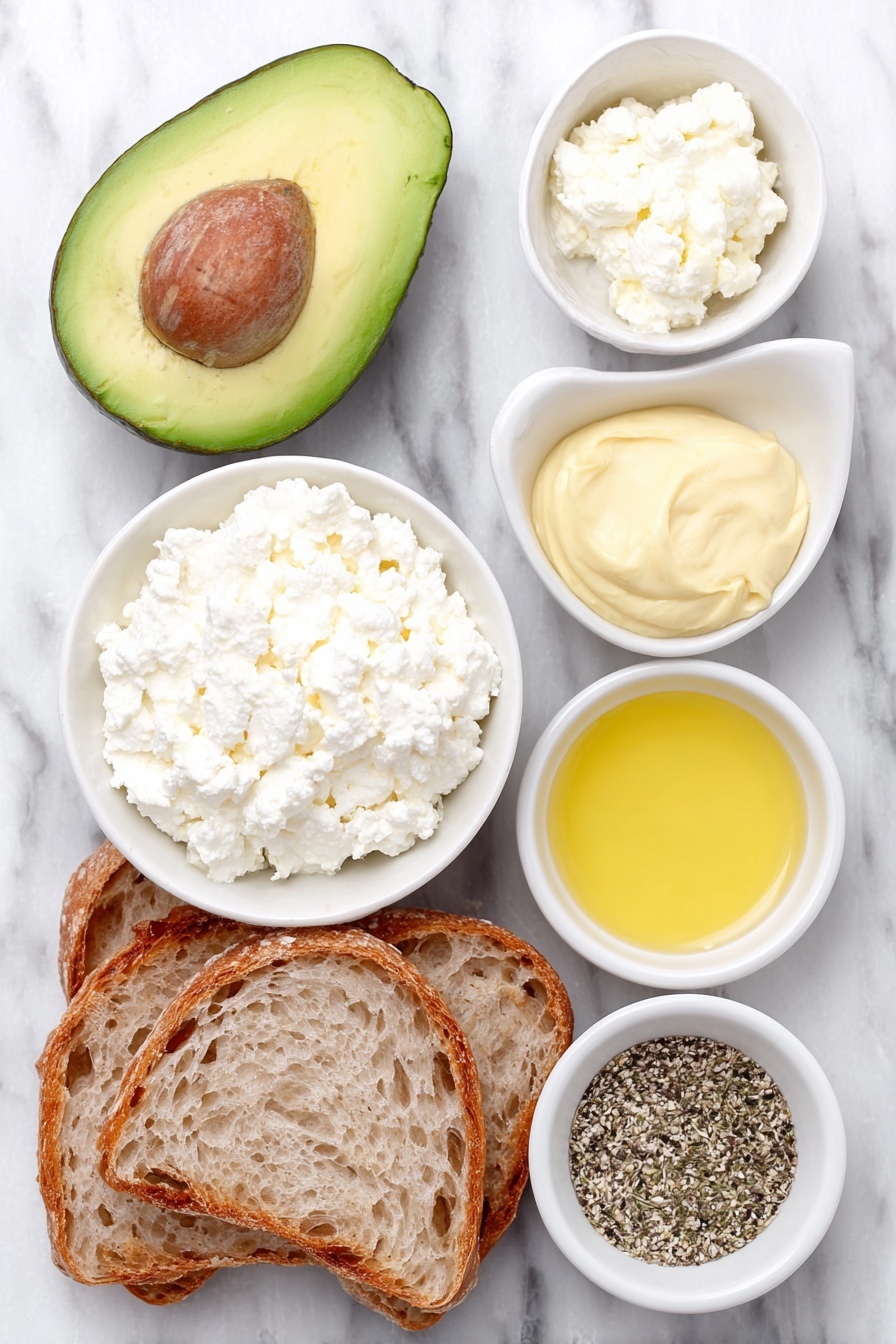 Flat lay of a halved ripe avocado with its pit removed, a small white ceramic bowl filled with creamy cottage cheese, a small white bowl containing fresh lemon juice, a small white bowl holding Dijon mustard, a small white bowl with golden honey, a small white bowl with mixed Everything but the Bagel seasoning, and two slices of rustic sourdough bread arranged symmetrically, all placed on a clean white marble surface, soft natural light, photo taken with an iPhone, professional food photography style, fresh ingredients, white ceramic bowls, no bottles, no duplicates, no utensils, no packaging --ar 2:3 --v 7 --p m7354615311229779997 - Creamy Cottage Cheese Avocado Toast, healthy breakfast ideas, quick avocado toast recipes, how to make flavorful avocado toast, easy cottage cheese toppings