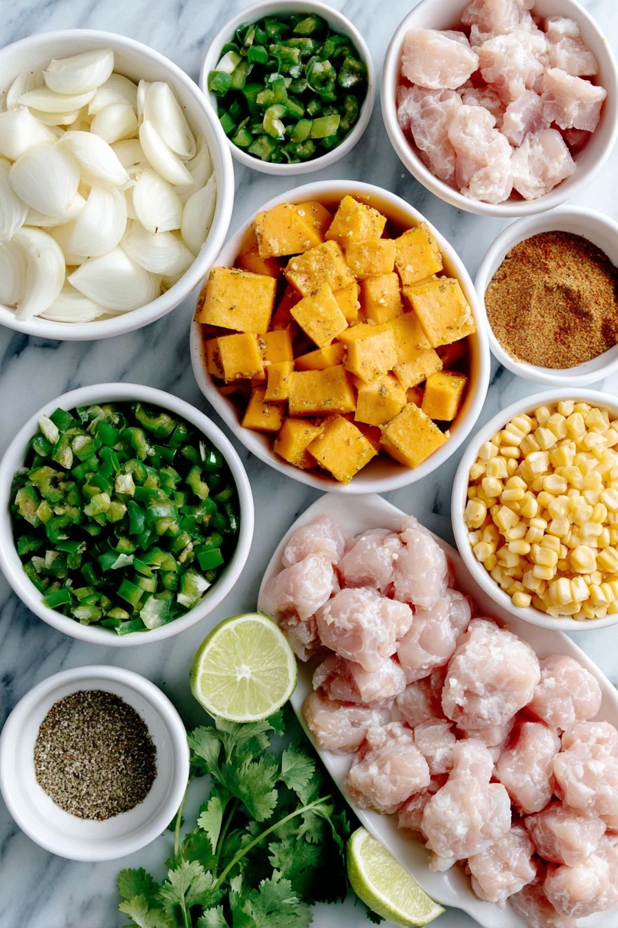 Flat lay of a few cloves of fresh garlic, one large white onion chopped, one green bell pepper diced very small, a small bunch of fresh cilantro sprigs, a small white ceramic bowl filled with diced mild green chiles, multiple bright orange cubes of butternut squash, a small white bowl containing ground cumin powder, a small white bowl with dried oregano, raw boneless skinless chicken thighs arranged neatly, a small white ceramic bowl with fresh yellow corn kernels, one small whole lime cut in half showing juicy interior, a small white bowl filled with coarse salt, and a small white bowl with freshly ground black pepper placed on a clean white marble surface, soft natural light, photo taken with an iPhone, professional food photography style, fresh ingredients, white ceramic bowls, no bottles, no duplicates, no utensils, no packaging --ar 2:3 --v 7 --p m7354615311229779997 - Butternut Squash Green Chile Chicken Soup, healthy comforting soup, easy fall recipes, dairy-free soup recipes, spicy butternut squash soup